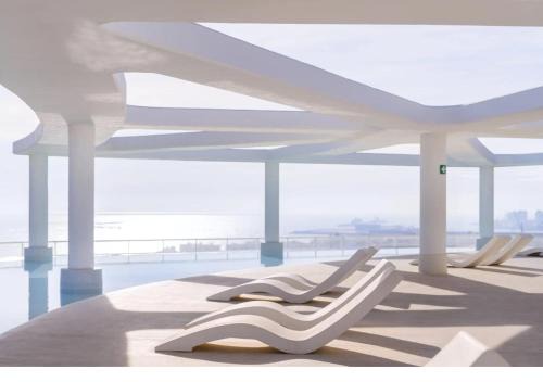 Canet de Berenguer Apartment | "BOUTIQUE H8" Beach Roof Terrace Infinity Pool Bar SPA Padel Swimming Pool