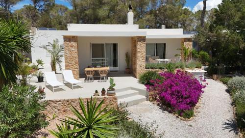 Sant Josep de sa Talaia Apartment | Stylish CASA CARACOL: Oceanfront Adults-Only Retreat