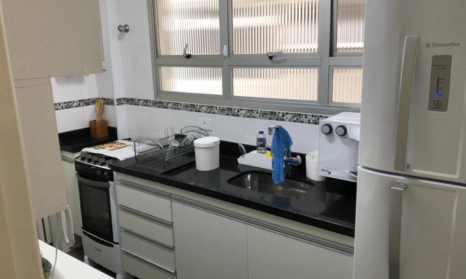 Parque Enseada Apartment | Cozy Apartment with Ocean View and Essential Amenities