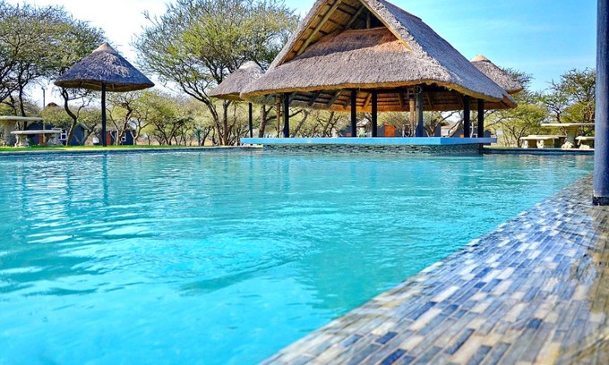 Polokwane Cabin | Discover Bradbury Game Lodge: Pool and Oceanfront Retreat