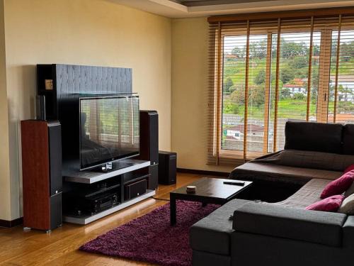 Sao Jorge House | Cozy Retreat at Brazão Guest House - Child Friendly Stay