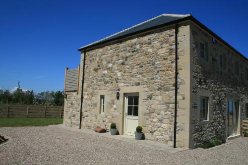 Bamburgh House | Inviting Breakers Hotel: Family and Pet-Friendly Retreat