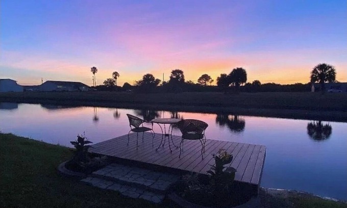 Pebble Beach House | Unforgettable Sunsets on Serene Canal with Private Dock