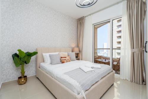 Dubai Production City Apartment | Breezy Studio at Lakeside Tower A