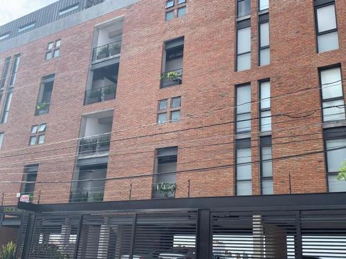 Queretaro Apartment | Brick Box Studio con Terraza