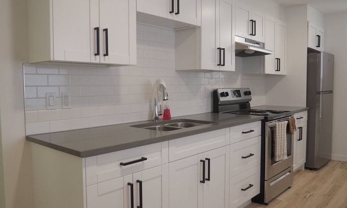 Winnipeg House | Inviting Home Near U of W with Spa and Family Amenities
