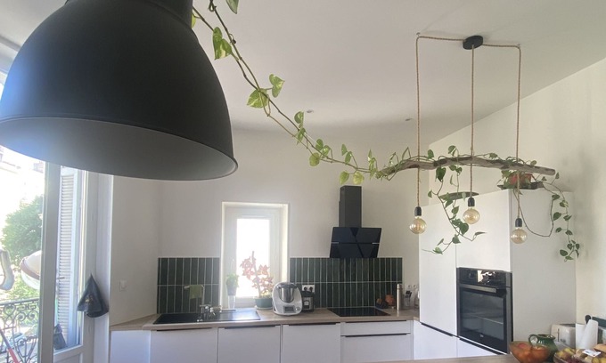 4th Arrondissement Apartment | Bright Apartment Steps from Parc Longchamp for Families