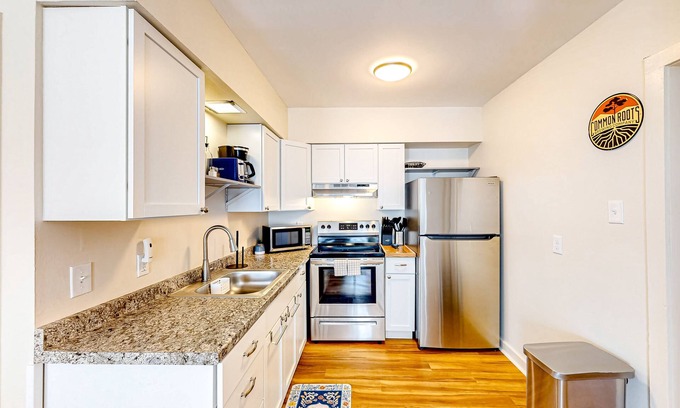 Glens Falls Apartment | Bright Apartment Steps from Town with Pool and Spa Access