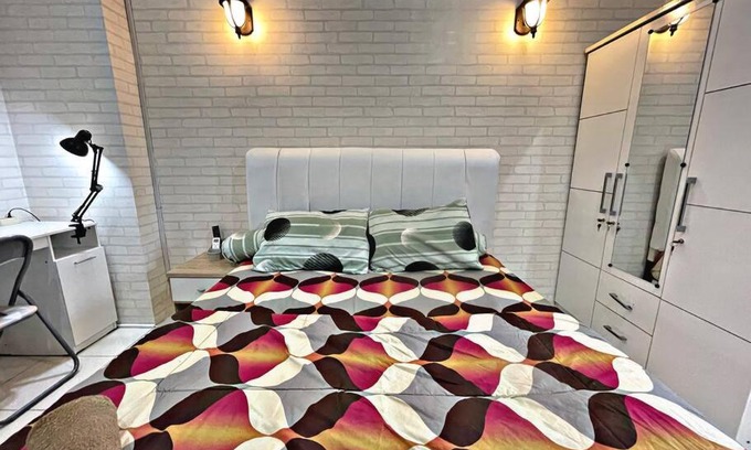 Pluit Apartment | Cozy Cityview Studio with SmartTV & Fast Wifi at Greenbay Pluit