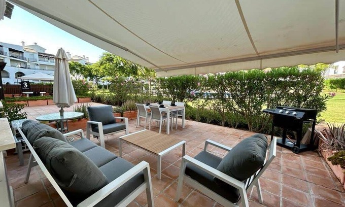 Roldan Apartment | Bright Ground Floor Apartment with Pool and Spa Amenities