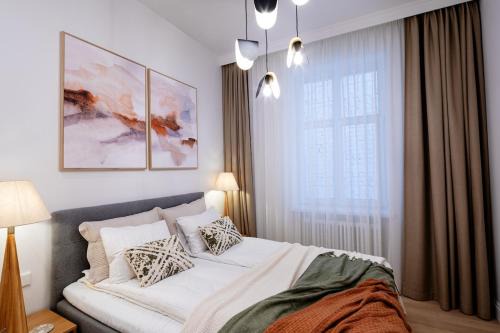 Centrs Apartment | Bright & Modern Apartment in Historic Raina Blvd Building I Near Park & Old Town