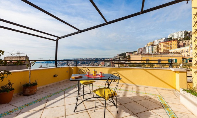 Vittorio Emanuele Apartment | Bright Rooftop Retreat by Napoliapartments: Rated 9/10