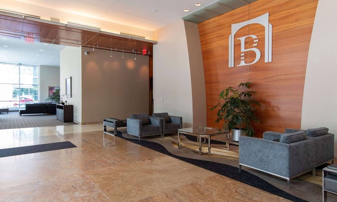 Downtown Apartment | Elegant Broadway Plaza: Spa & Pool Retreat, Guest Rated 9.2
