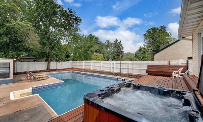 Brooklyn Center House | Brookstone Bliss: Pool, Hot Tub & Games Await You