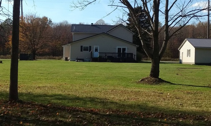 Austinburg House | Experience Brown Tin Roof Farmhouse: Pet-Friendly Retreat