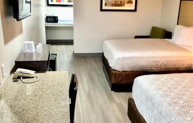 Denison Hotel | Budget-Friendly Budget Inn: Pet and Child Friendly Stay