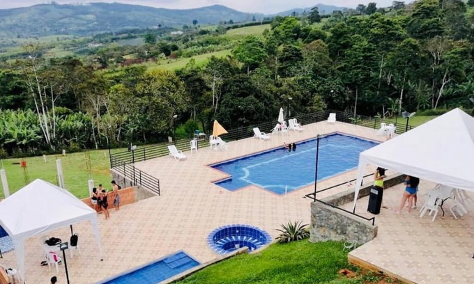 Calima Hotel | Discover Buen Vivir Restrepo: Family-Friendly & Pet Welcoming