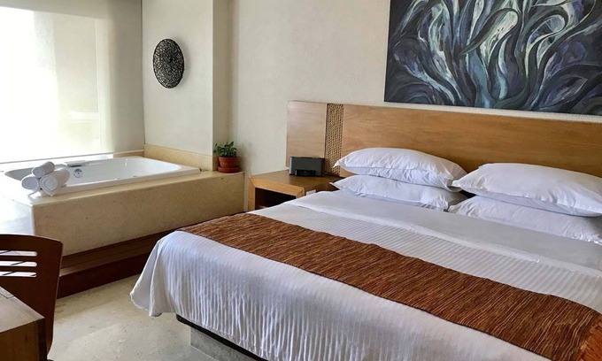 Olimpica Hotel | Inviting Buganvilias Resort Suite with Hot Tub & Family Fun