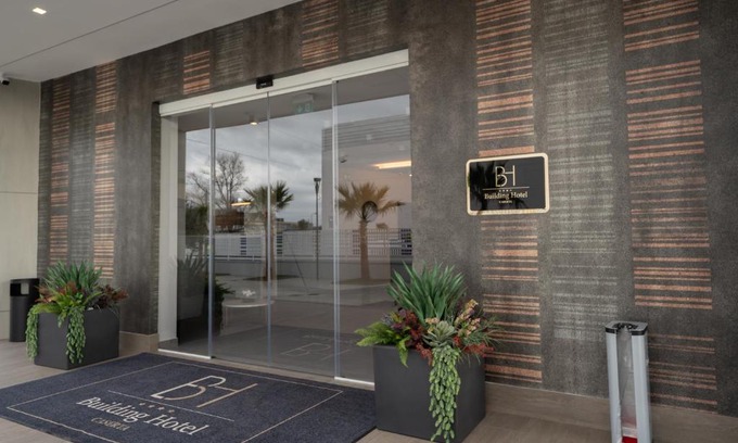 Carinaro Hotel | Discover Building Hotel: 4-Star Stay with Top Amenities