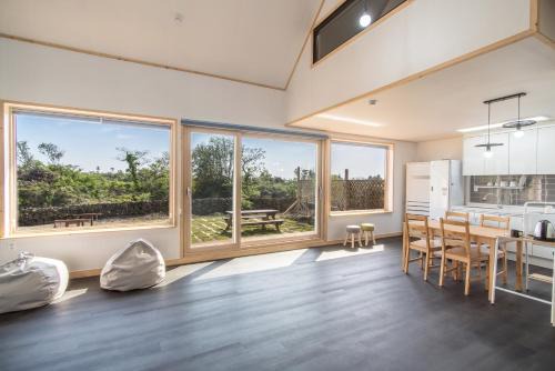 Hallim House | Eco-Friendly Retreat at Built in Garage Jeju with Hot Tub