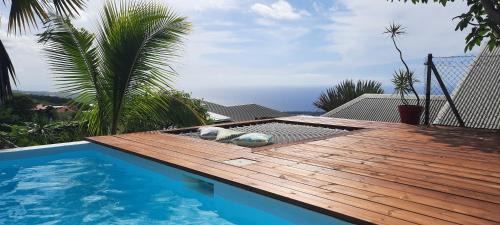 Bois de Nefles Ski Chalet | Cozy Bungalow with Pool and Ocean View Retreat