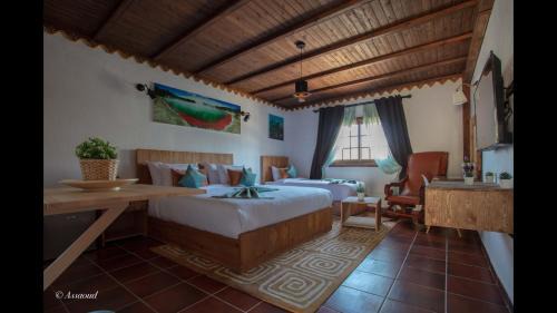 Derdara House | Comfortable Bungalow Room with Pool Access at El Cortijo
