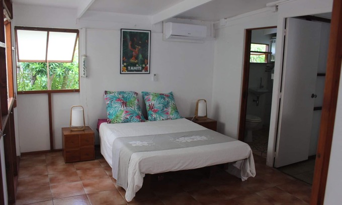 Temae House | Seafront Bungalow with Garden Access and Spa Amenities