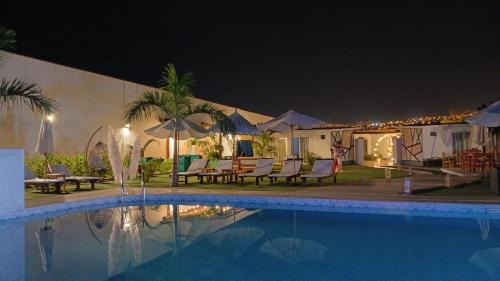 Ventanilla Hotel | Family-Friendly Bungalow Jatun Mama with Pool Access