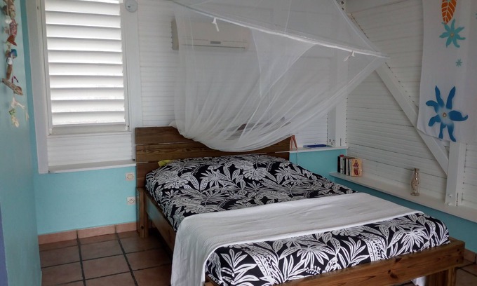 Sainte-Anne Cottage | Pet-Friendly Bungalow - Ste Anne with Oceanfront Views