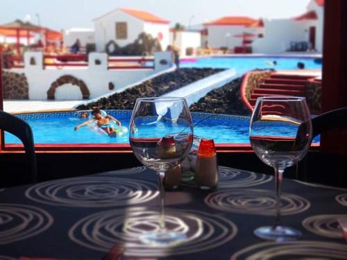 Caleta de Fuste Resort | Cozy Bungalows Castillo Beach: Oceanfront Bliss Awaits