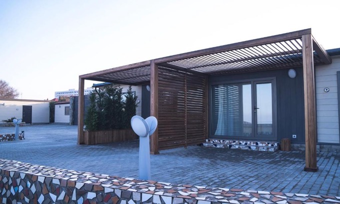 Baku House | Oceanfront Retreat: Burada with Private Beach & Top Ratings
