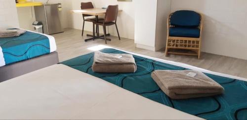 Home Hill Hotel | Relax at Burdekin Motor Inn with Pool & Family Amenities