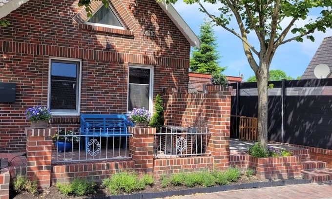 Krummhoern Apartment | Pet-Friendly Burghaus 1: Cozy Retreat with Ocean Views