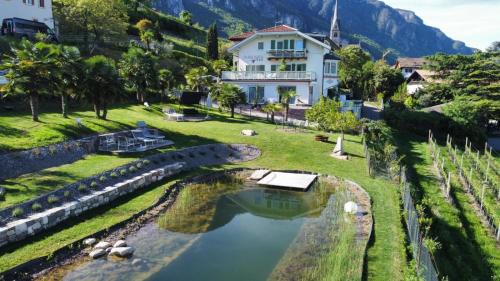 Montagna House | Discover Burgunderhof: Oceanfront Retreat with Pool & Dining