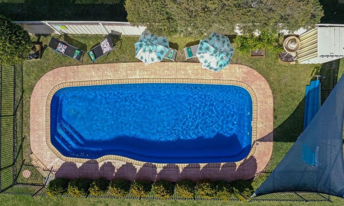 Culburra Beach House | Oceanfront Burra Bliss: 4-Star Haven with Pool Access