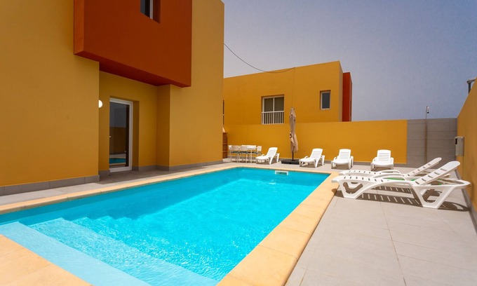 Puerto del Rosario House | Relaxing Getaway at Butterflies Pool: 9.4/10 Rated Retreat