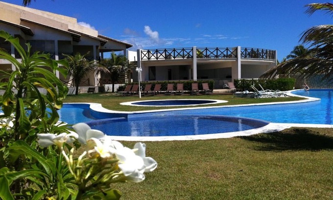 Alcacus Apartment | Beachfront Bliss at Buzios Beach Club with Pool & Hot Tub