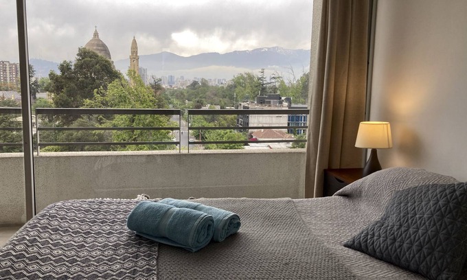 Quinta Normal Apartment | Central and Serene Hotel with Mountain Views & Spa Amenities