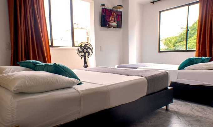Suramericana House | Cozy Room for Four in the Stadium Area - Family Friendly