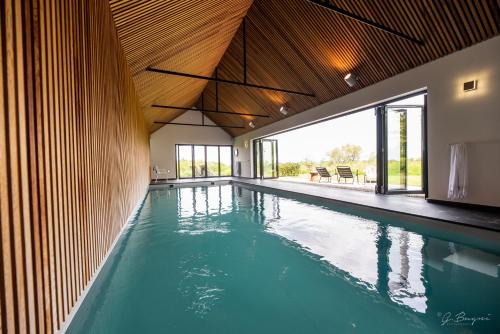Herve Bed & Breakfast | Experience côté verger B&B: Oceanfront Bliss Awaits