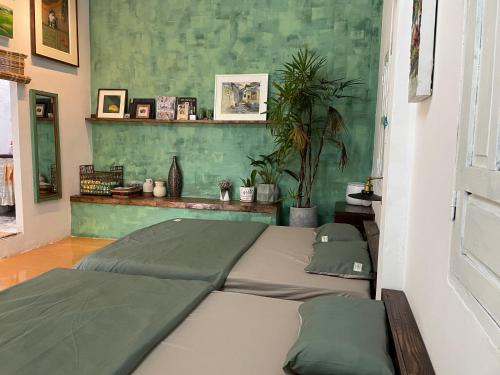 Buon Ma Thuot House | Artistic Cọ cùn Homestay: Child-Friendly Comfort Awaits