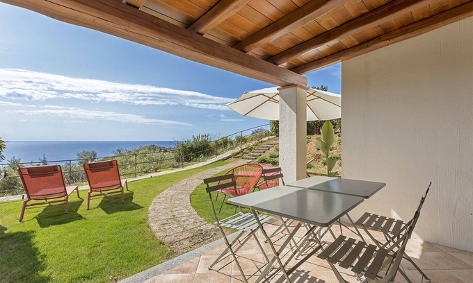 Tertenia Apartment | Seaview Apartment with Pool: A Relaxing Coastal Retreat