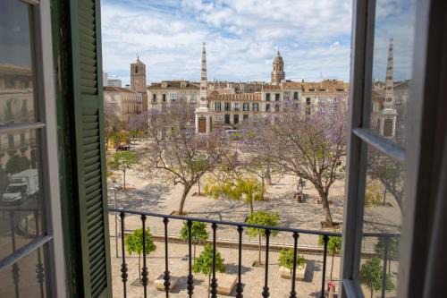 La Victoria Apartment | Elegant 6 Bedroom Retreat in Plaza de la Merced