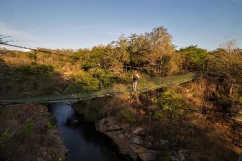 Curubande Cabin | Discover Cañon de la Vieja Lodge with Pool & Spa Amenities