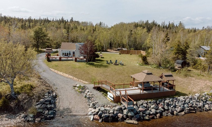 Salmon River Road House | Experience The Cedar: Waterfront Retreat with Kayaks & Sauna