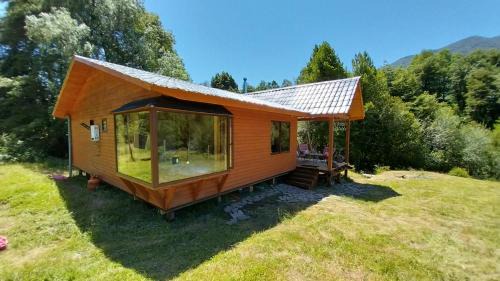 Pucon Ski Chalet | Riverside Retreat: Pet-Friendly Cabaña by Liucura River