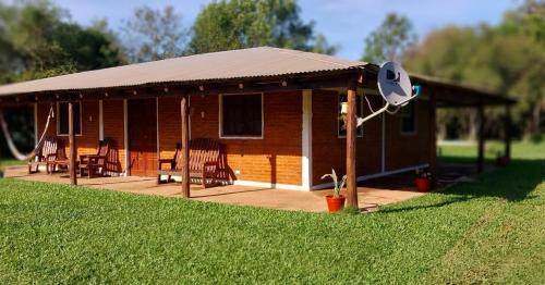 Colonia Carlos Pellegrini Apartment | Discover Cabaña Iberá: Poolside Retreat for Families