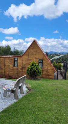 Guarne House | Relax in a Cozy Cabaña with Jacuzzi and BBQ Zone