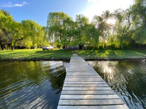 Quillon House | Inviting Cabaña with Dock by the Lagoon and Ocean View
