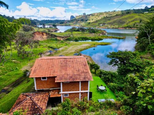 Guatape House | Cabaña de Vacaciones Septimo Cielo